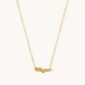 Mini zodiac necklace in 14k gold fill with a tiny zodiac sign pendant