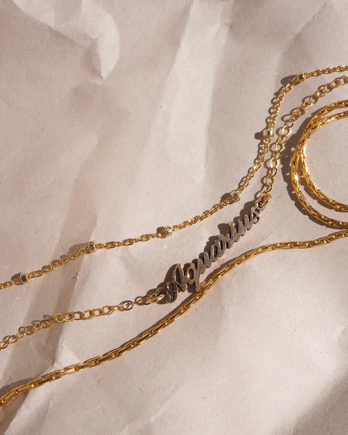 Teeny tiny zodiac pendant necklace in 14k gold fill by Beads by Tara