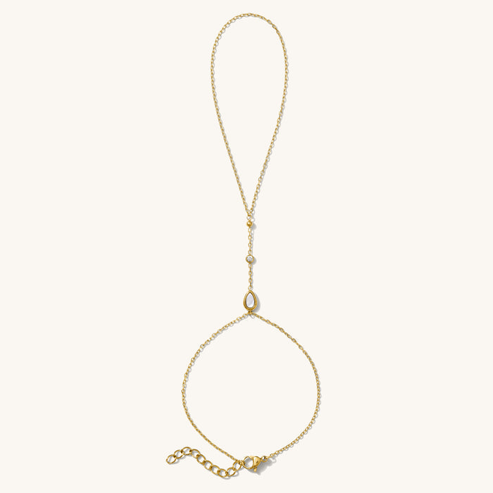 Mother of Pearl hand chain in 14k gold fill with white topaz and shell inlay