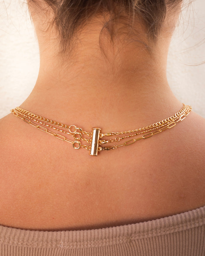 Beads by Tara necklace separator styled with layered dainty chains
