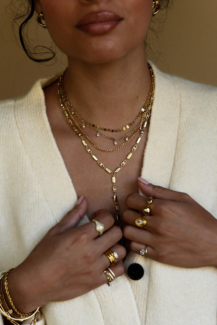 Ornamental gold lariat necklace from the Beads by Tara Nellie design