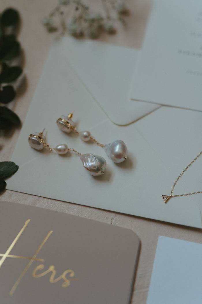 The gold and freshwater pearl Opaline statement earrings from Beads by Tara