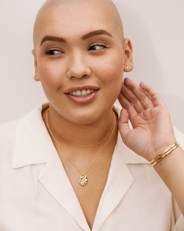 Bryan Anthonys Overcome Gold Earrings On Model