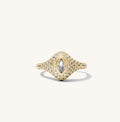 Close up of the gold pave signet ring shown on a white background