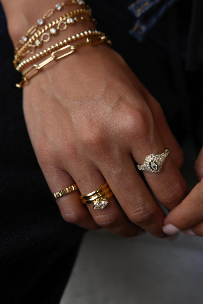 Bold gold signet ring with a marquise centerpiece by Beads by Tara