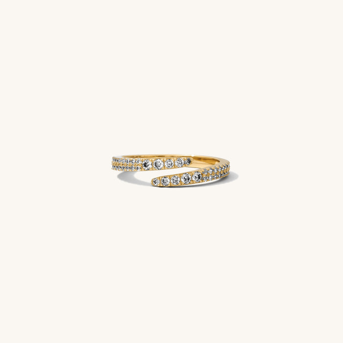 Detail view of the gold Pavé Wrap ring on a white background