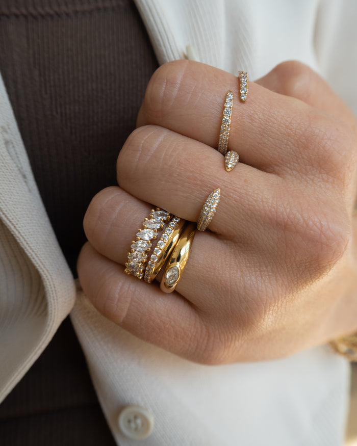 Model wearing the gold Pavé Wrap ring in a Beads by Tara campaign