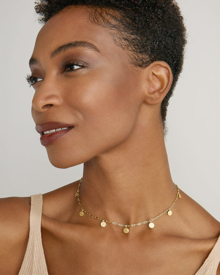 Model wearing Phases Choker in 14k gold finish