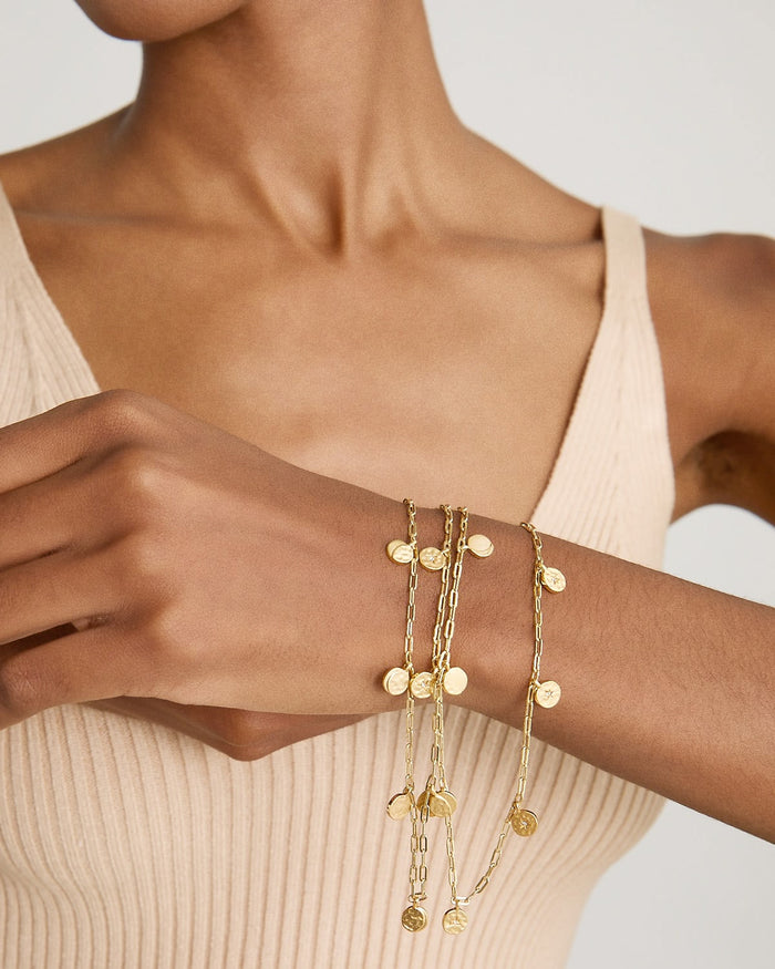 Model wearing Phases Choker in 14k gold finish
