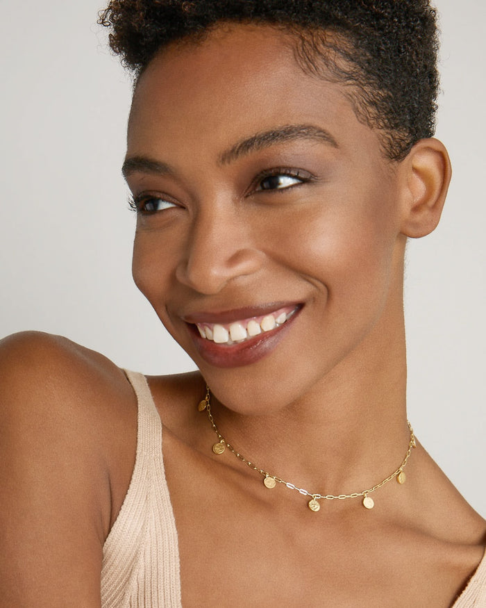 Model wearing Phases Choker in 14k gold finish
