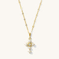 Queen's Cross necklace with pearls set along a pointed gold vermeil cross