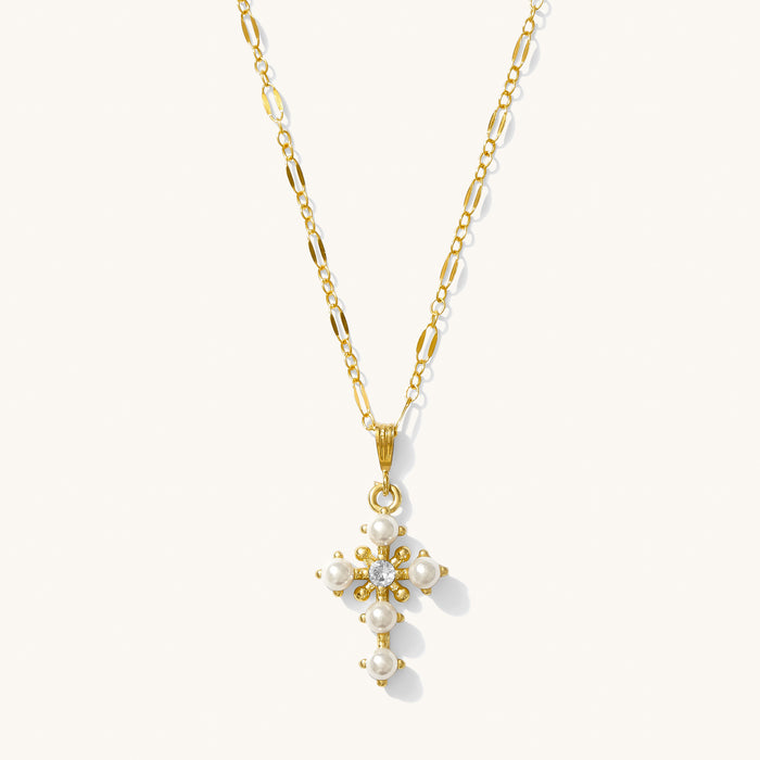 Queen's Cross necklace with pearls set along a pointed gold vermeil cross