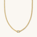 Close up of the gold Rocky cuban chain necklace on a white background