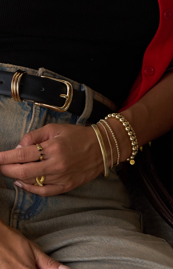 Close view of the emerald stones at the opening of the Roman cuff ring