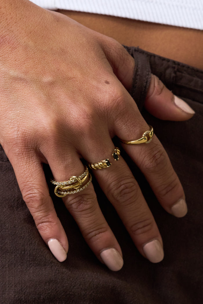 Close view of the black onyx stones at the opening of the Roman cuff ring