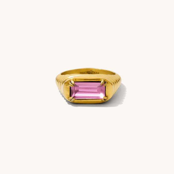 Close up of the Rosewater ring with a warm vintage-inspired gemstone on a white background