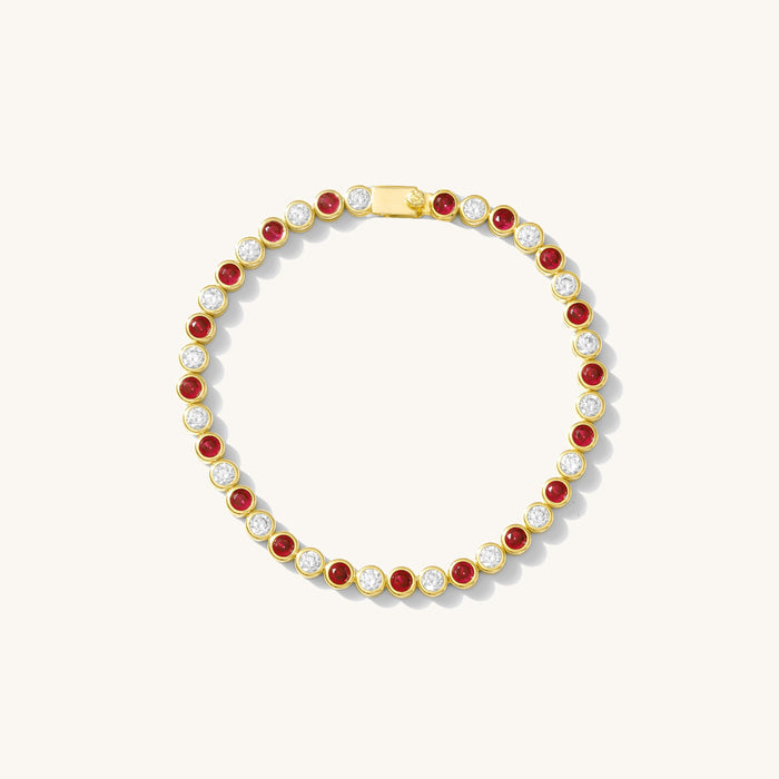Bracelet with red and white stones on a white background