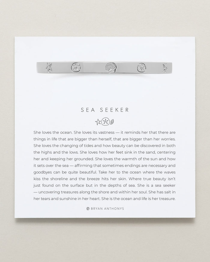 Bryan Anthonys Sea Seeker Silver Hinged Bracelet with sea shell engravings on card