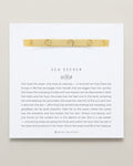 Bryan Anthonys Sea Seeker Gold Hinged Bracelet with sea shell engravings on card