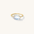 She's a Gem ring with a raw faceted moonstone set on a sparkling pavé band