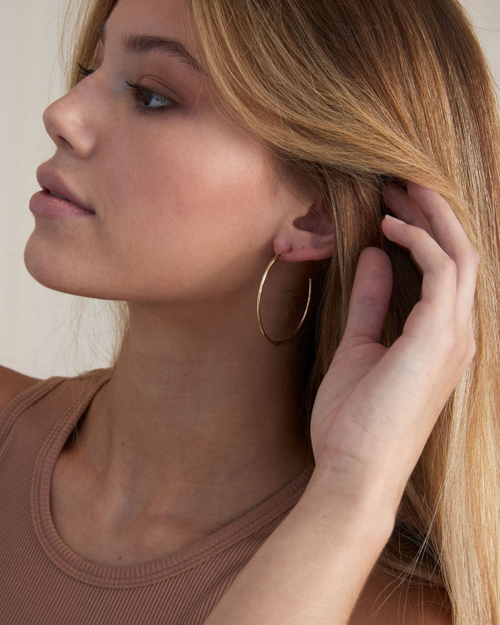 BRYAN ANTHONYS SIMPLICITY MAXI HOOP EARRINGS ON MODEL