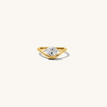 Close up of the gold Solitaire Wave pinky ring with an oval stone on a white background