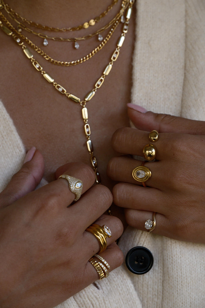 The bold gold Cabana ring, an open cuff design in stainless steel