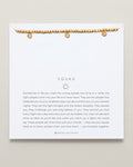 Close-up of Squad Beaded Icon Bracelet in 14k gold finish
