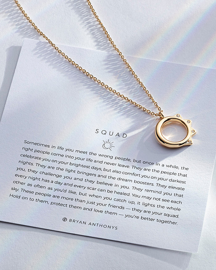 Squad Necklace showcase in 14k gold on card