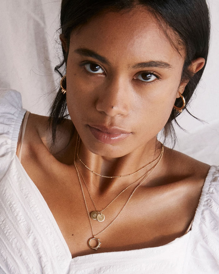 Bryan Anthonys Squad Gold Necklace on model