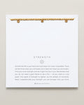 Close-up of Strength Beaded Icon Bracelet in 14k gold finish