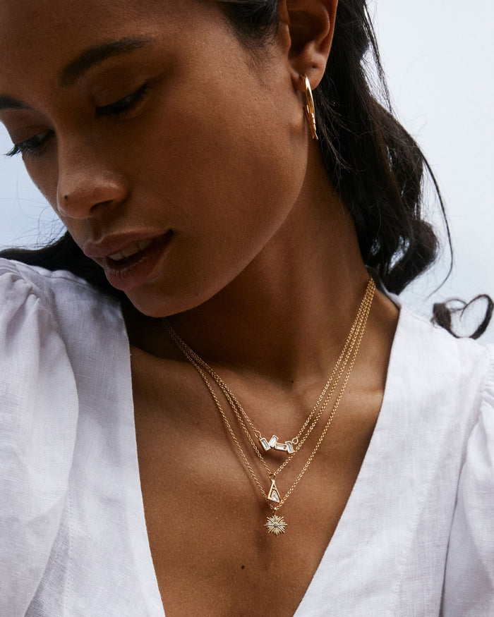 Bryan Anthonys Strength Gold Necklace with Crystal On Model