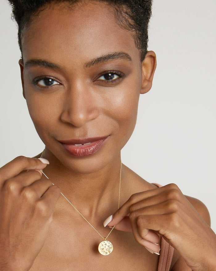 Model wearing Sun Moon & Stars Necklace