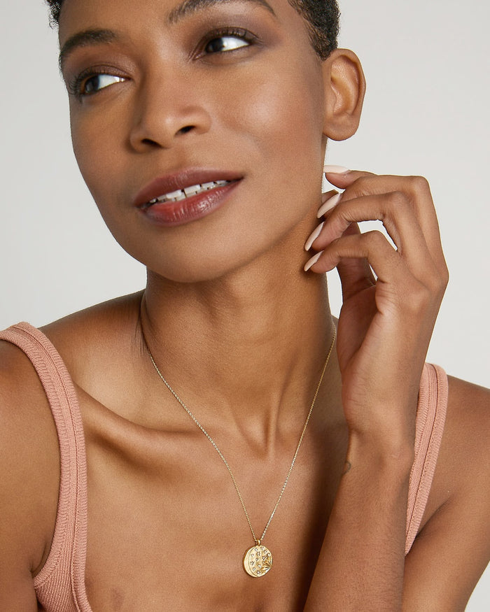 Model wearing Sun Moon & Stars Necklace