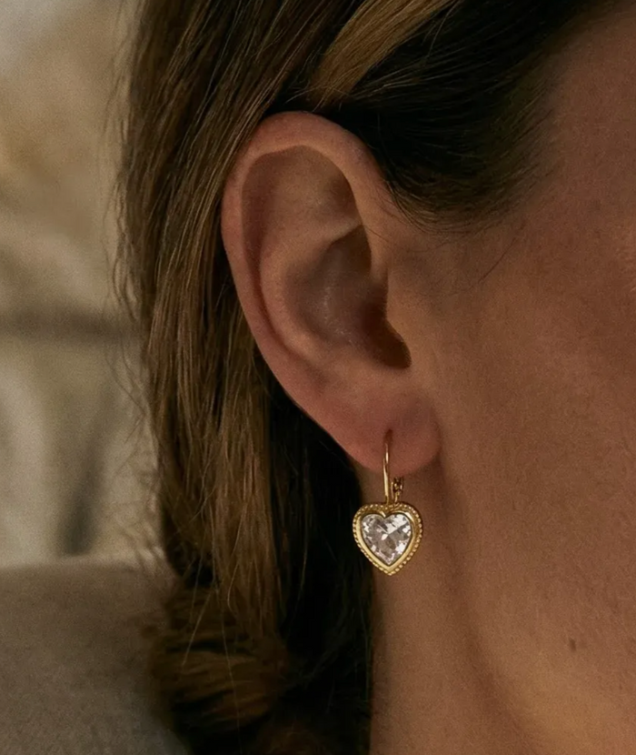 Sweetheart earrings with a faceted heart drop in a 14k gold plate halo setting