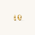 Close up of gold hoop earrings on a white background