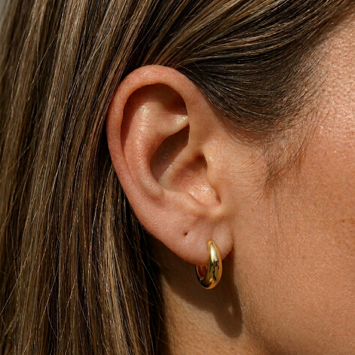 Tara hoop earrings in 14k gold vermeil with a sloped, lightweight design