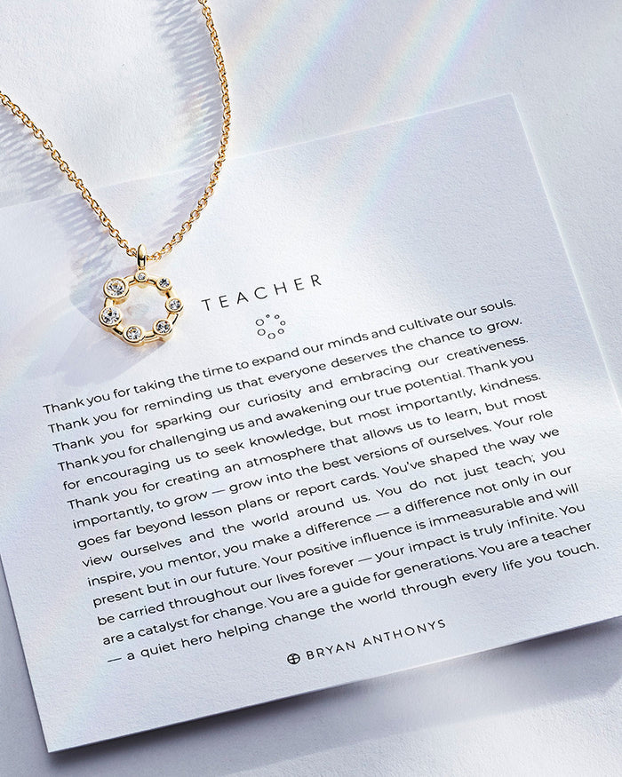 Teacher Necklace showcase in 14k gold on card