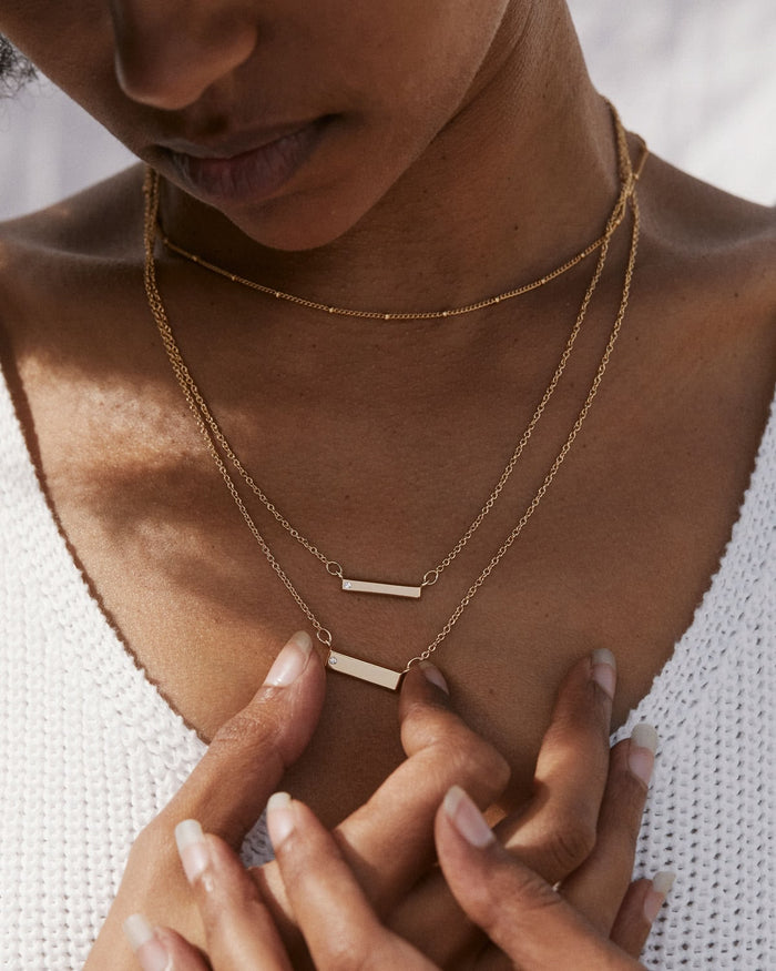 Bryan Anthonys Through Thick and Thin Gold Necklace Set with Crystals on model