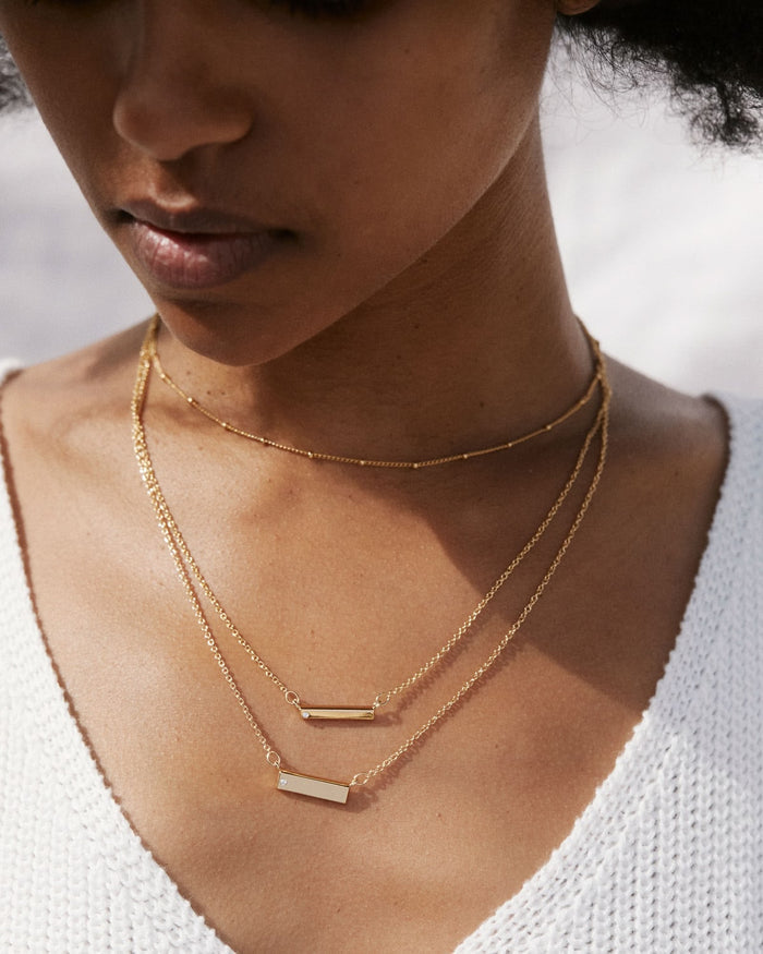 Bryan Anthonys Through Thick and Thin Gold Necklace Set with Crystals on model