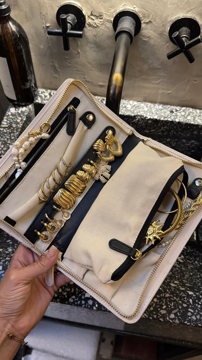 Vegan suede travel jewelry case for storing necklaces, rings, and earrings