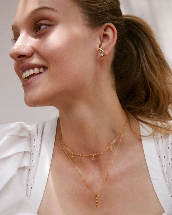 Bryan Anthonys Tribe Gold Earrings With Crystals On Model