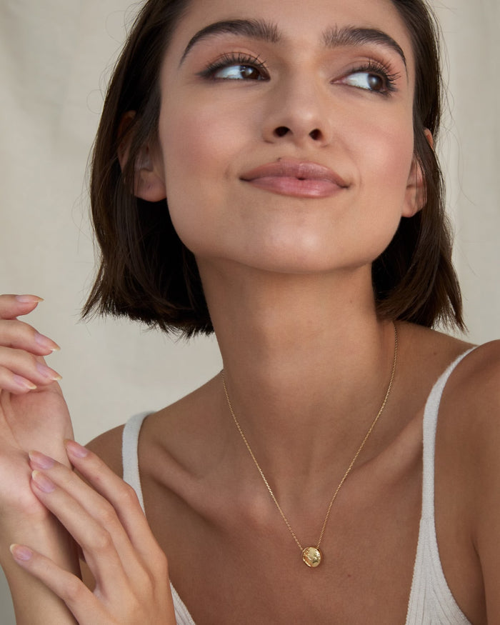 Bryan Anthonys Us Against The World Gold Necklace On Model