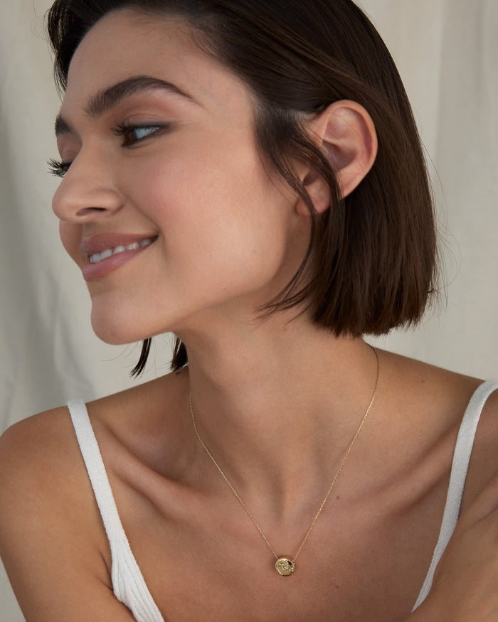 Bryan Anthonys Us Against The World Gold Necklace On Model
