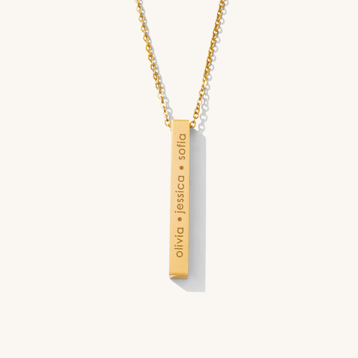The Vertical Bar necklace, a 3D bar pendant engravable on all four sides
