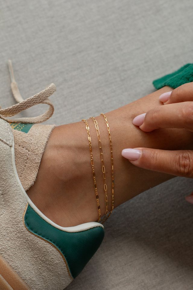 The gold-filled Vica anklet, designed to shine with any outfit