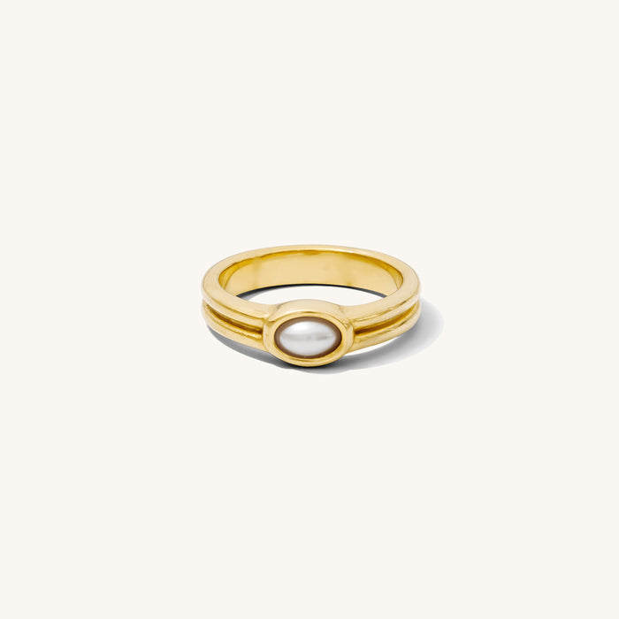 Close up of the gold Vintage Pearl ring on a white background