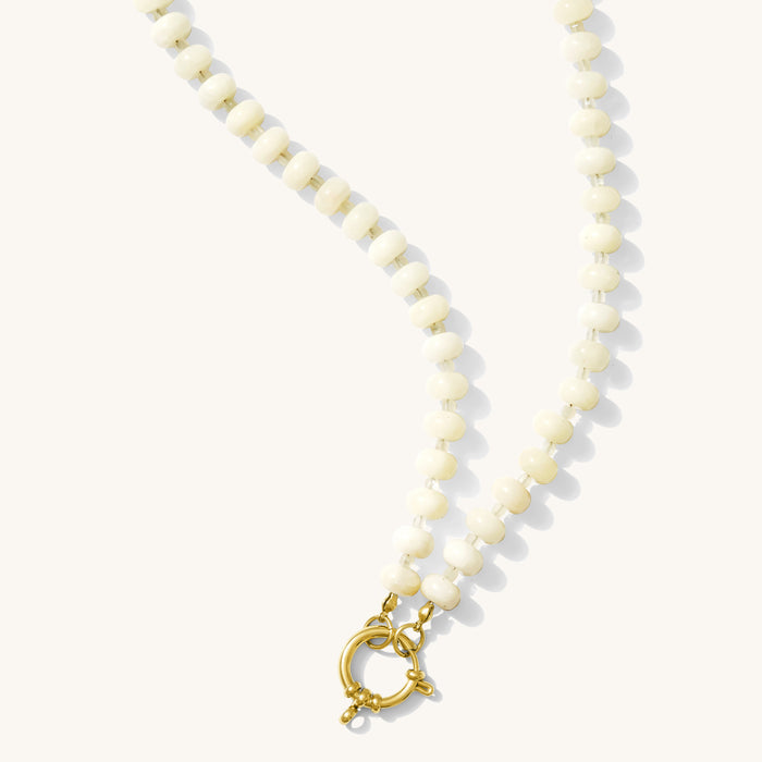 The White Mocha gemstone necklace in creamy white quartz with a gold sailor clasp
