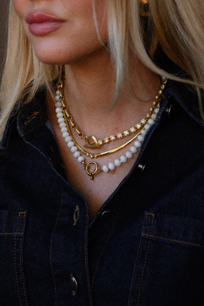 White Mocha necklace strung with creamy white quartz beads and gold hardware