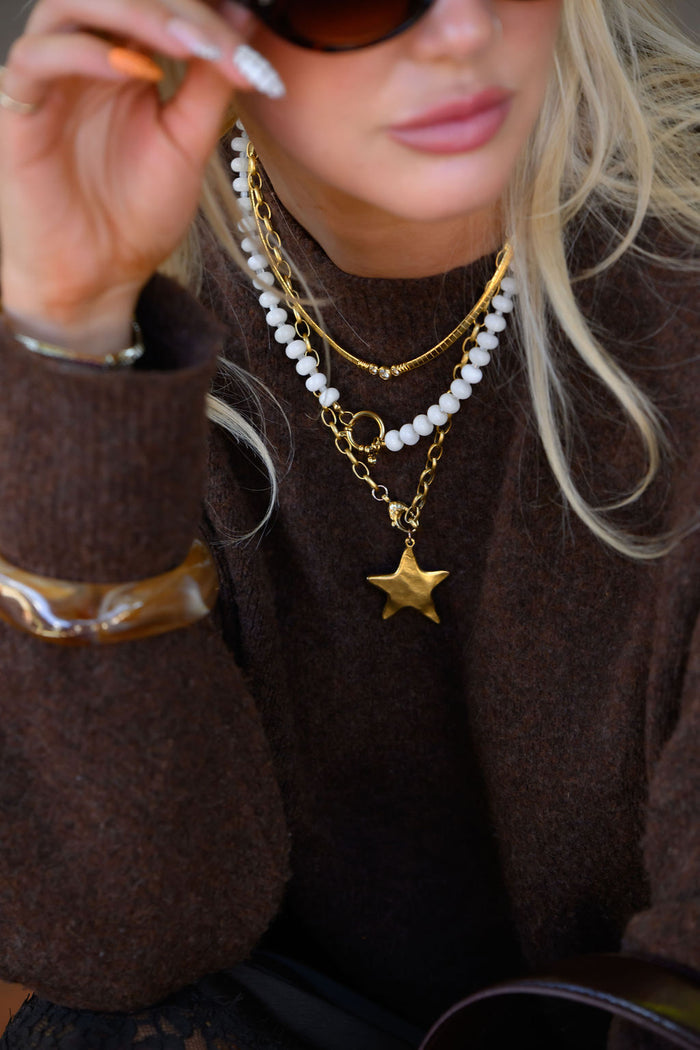 The White Mocha necklace, creamy quartz beads made for layering with charms